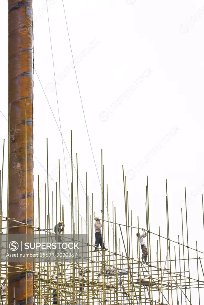 Construction workers working at construction site