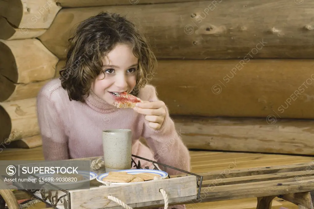 Girl having snack