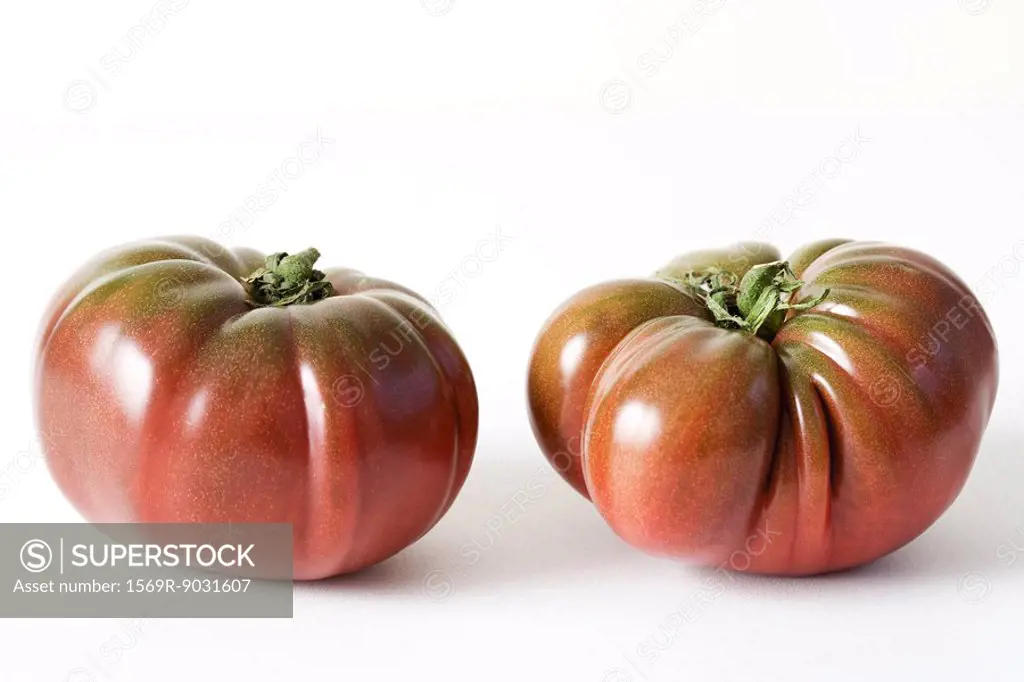 Two heirloom tomatoes, close-up