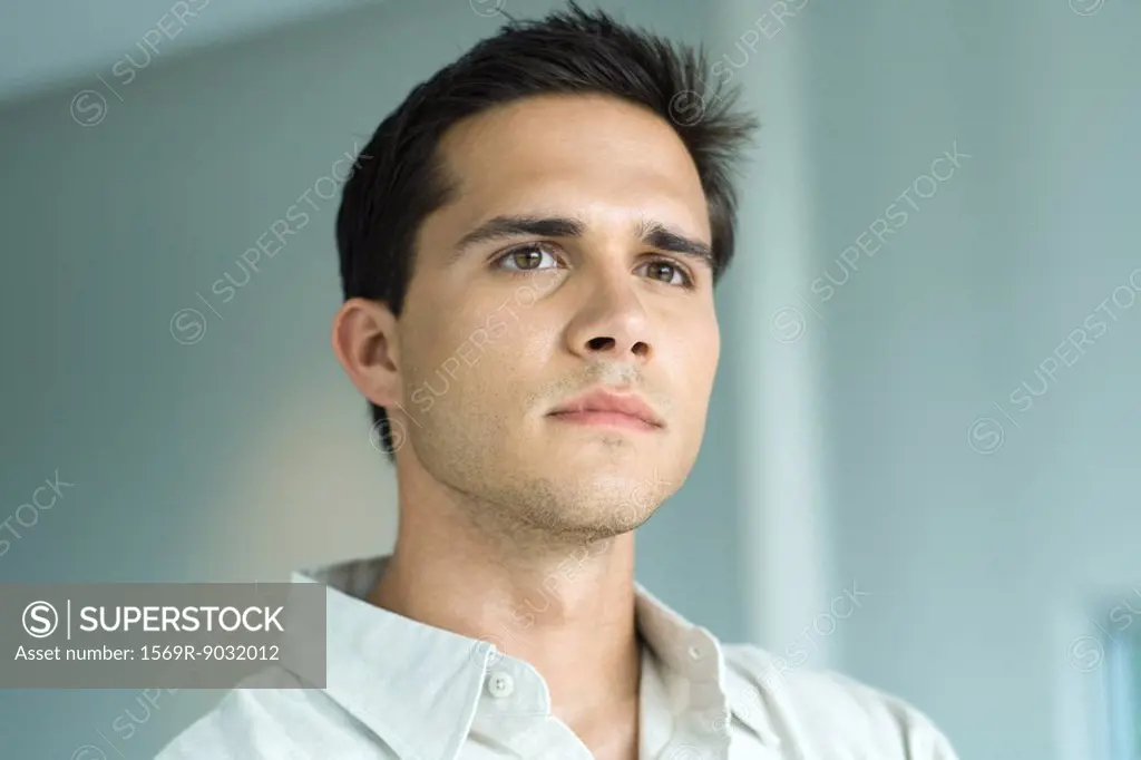 Young man looking away, portrait