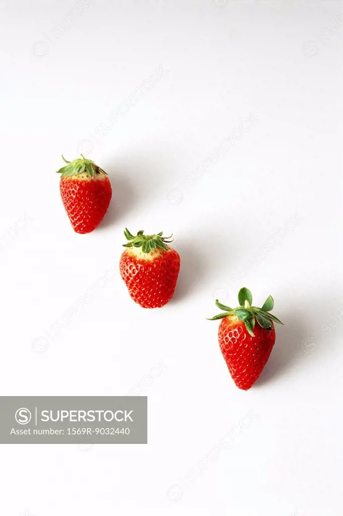 Three strawberries in a diagonal row