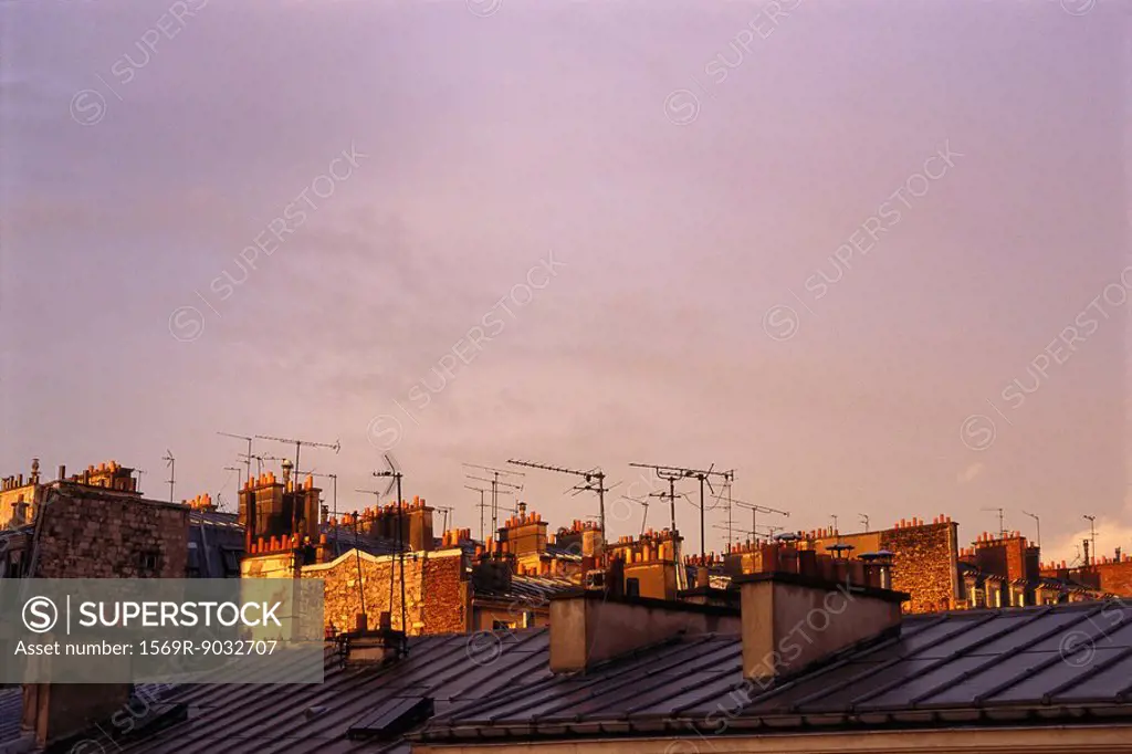 Rooftops with television antennae