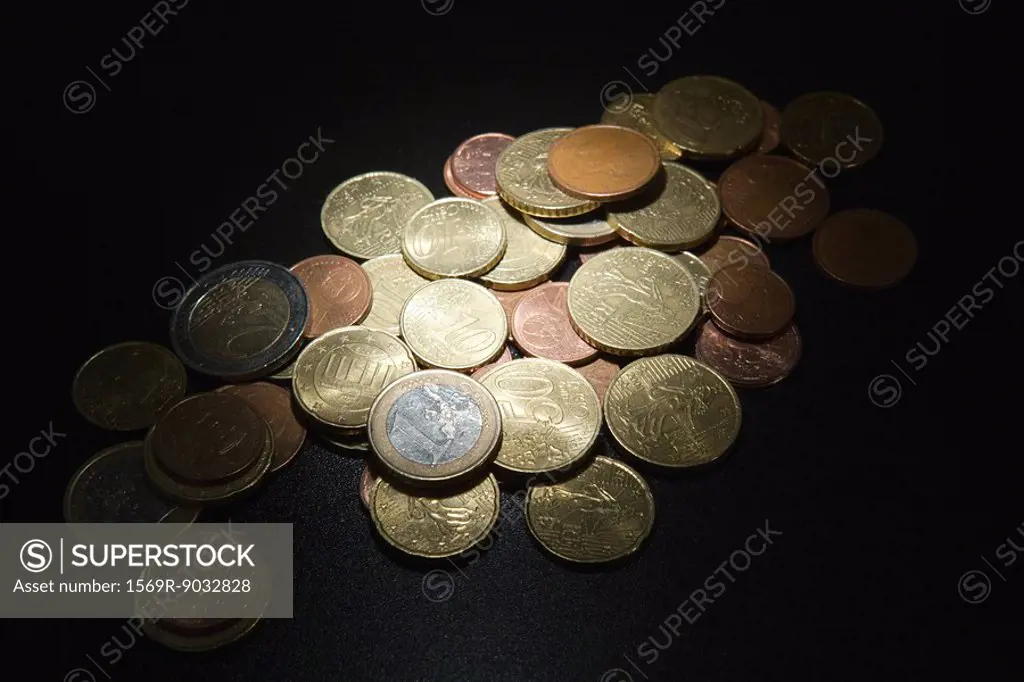 Assorted Euro coins in a pile, close-up