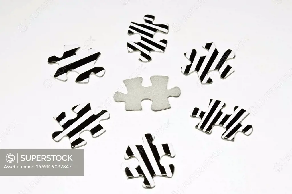 Jigsaw puzzle pieces, close-up
