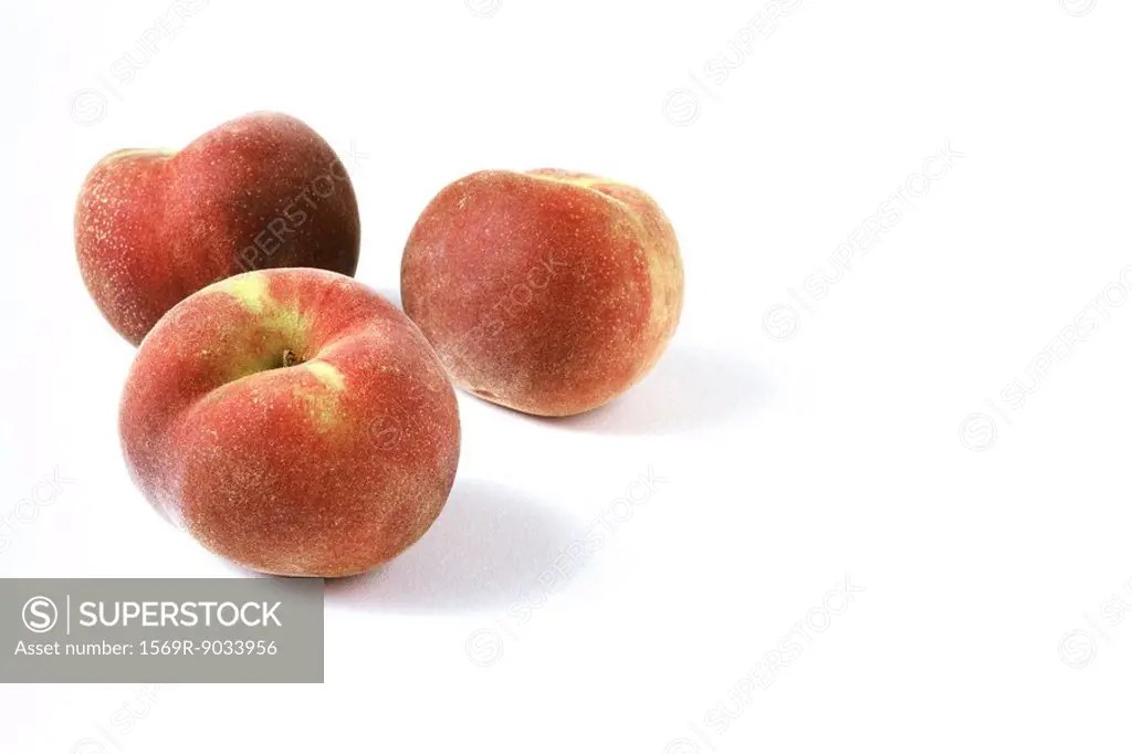 Three peaches, close-up
