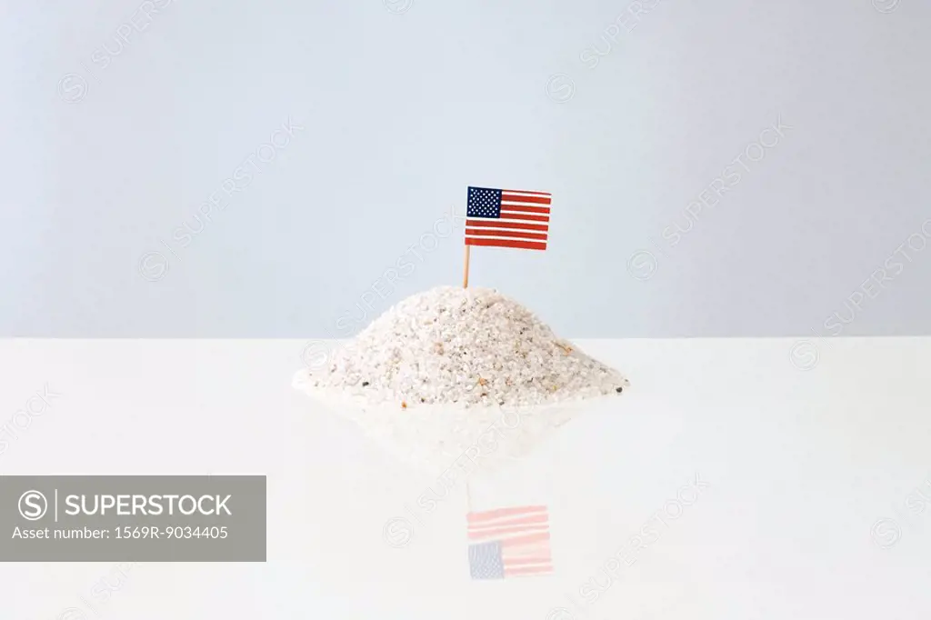 American flag sticking into pile of salt