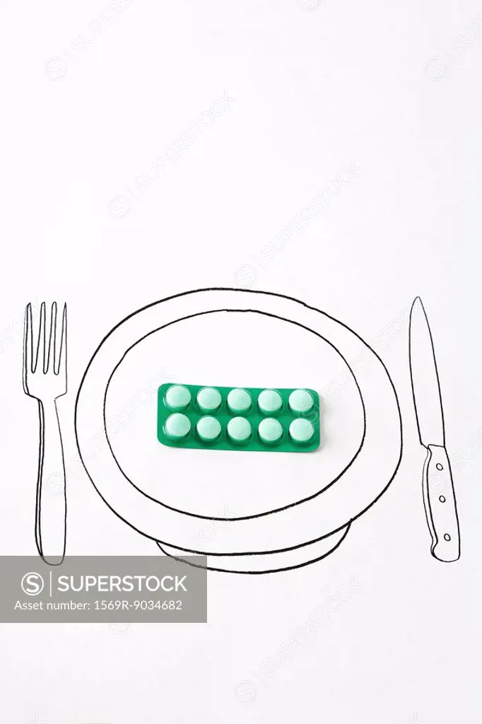 Real pack of pills on drawing of plate