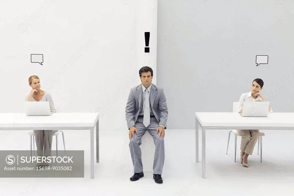 Man sitting in office with exclamation mark over his head, women on either side with blank word bubbles