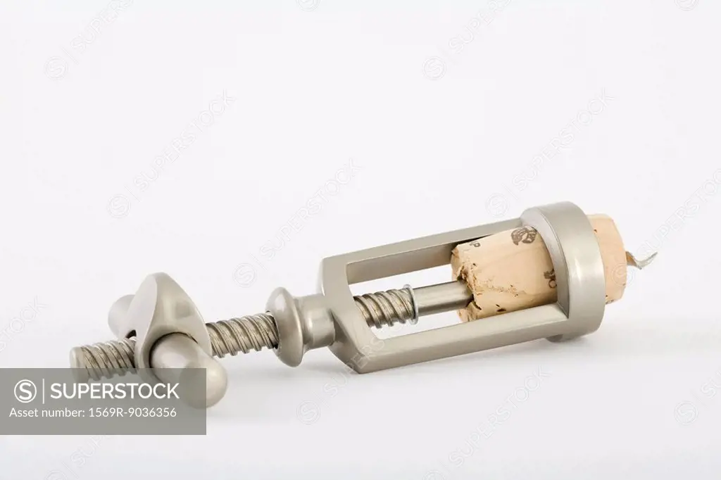 Corkscrew and cork, close-up