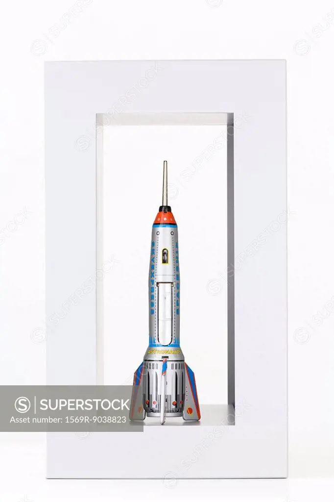 Toy rocket inside rectangular box