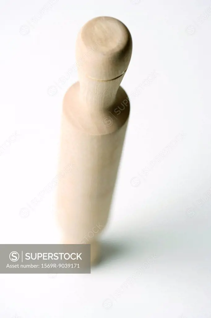 Rolling pin balanced on one end, high angle view