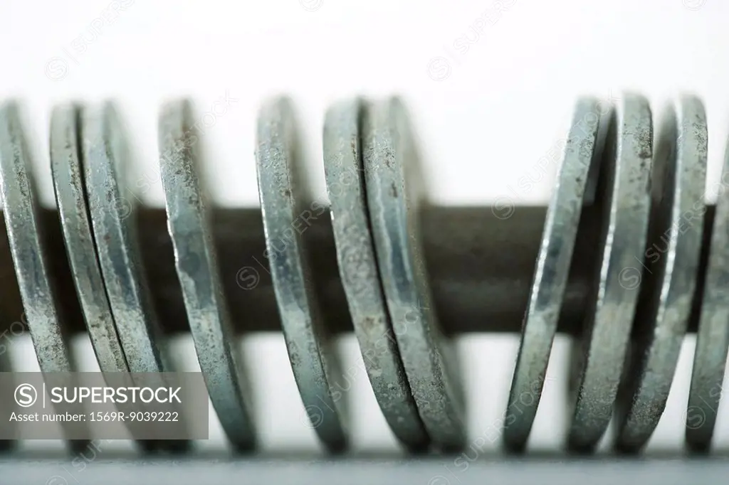 Metal washers on screw, extreme close-up