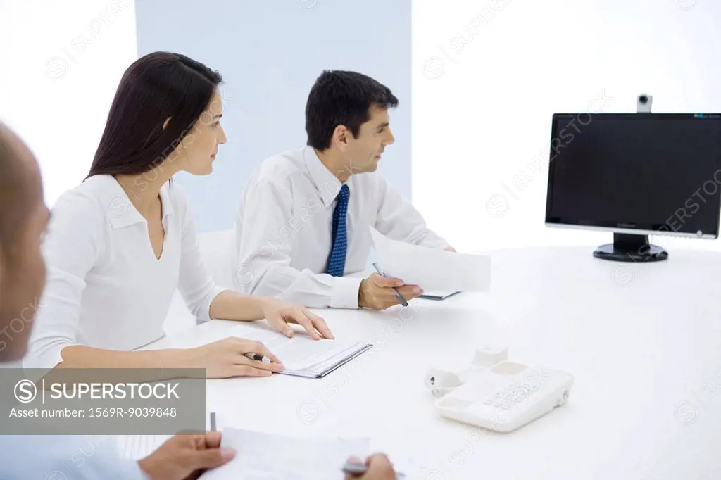Group of executives having teleconference