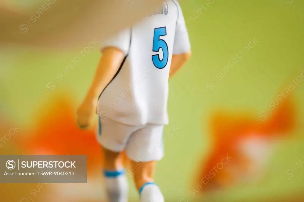Toy figurine of soccer player