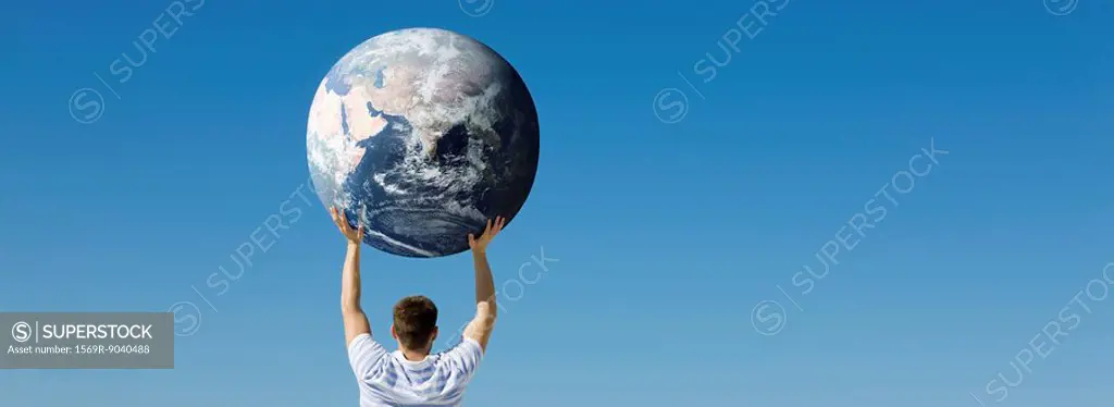 Man holding up earth