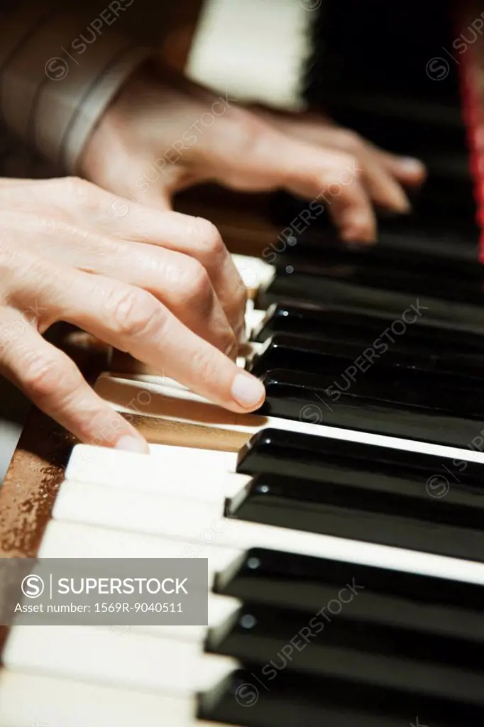 Playing piano, close_up