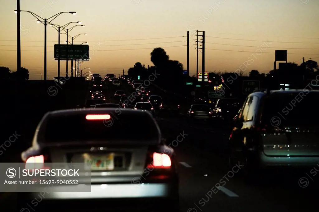 Traffic on highway at dusk