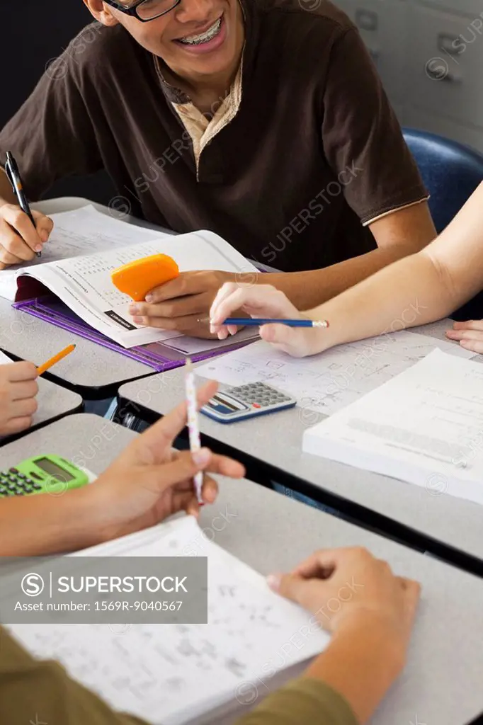 High school students studying together, cropped