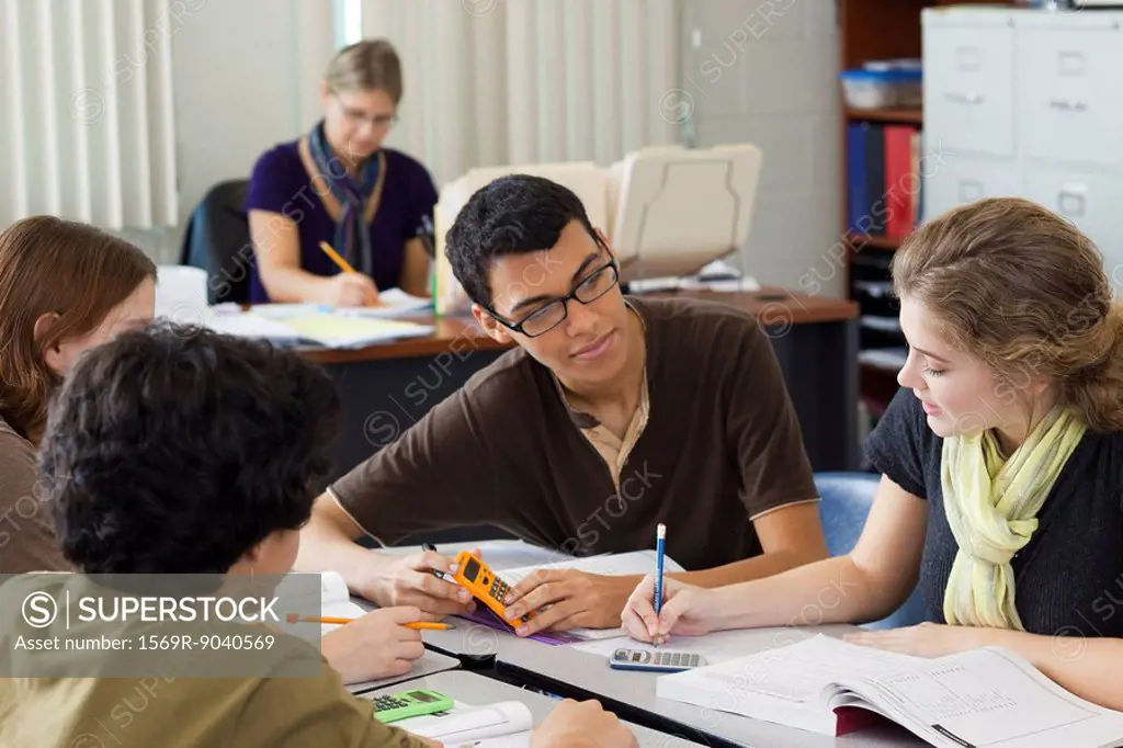 High school students studying math together