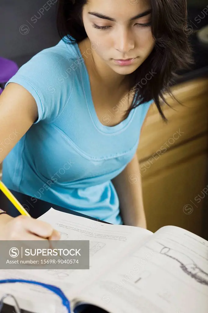 High school student doing classwork