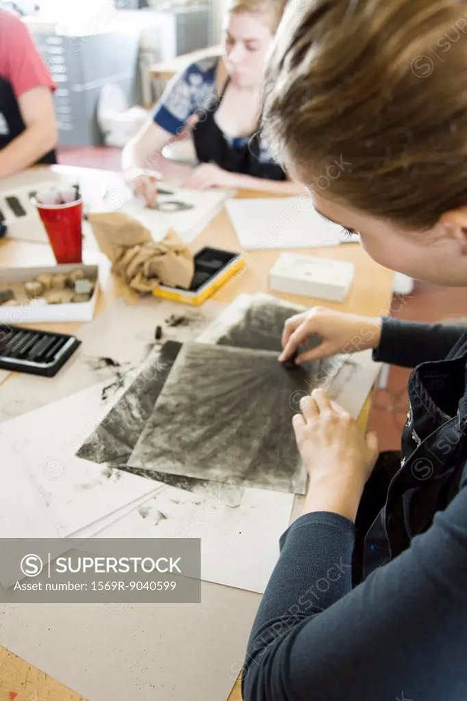 Art students drawing with charcoal