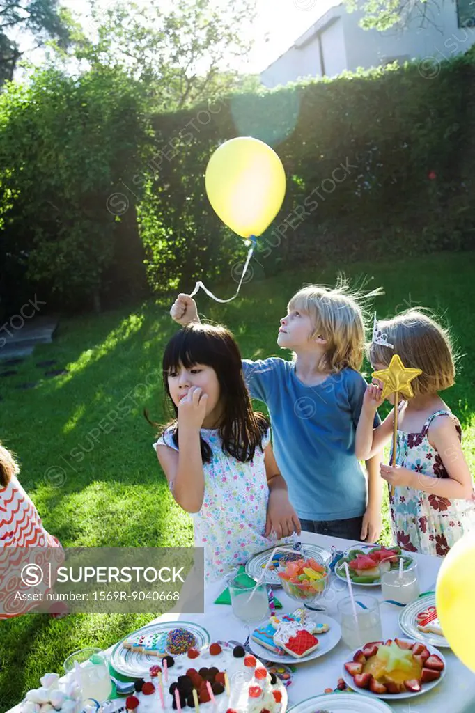 Children at outdoor birthday party