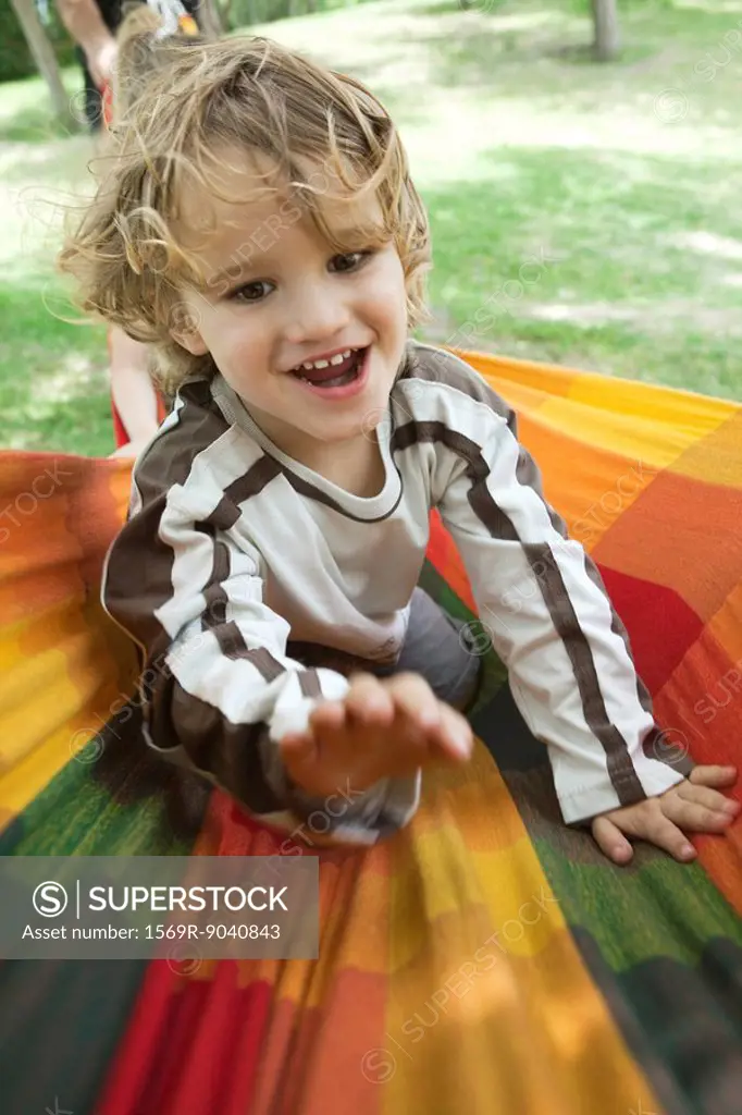 Little boy having fun outdoors, portrait