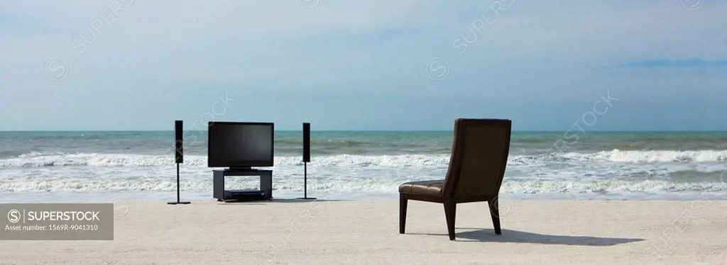 Home theater and chair on beach