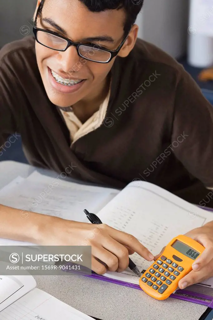 High school student using calculator