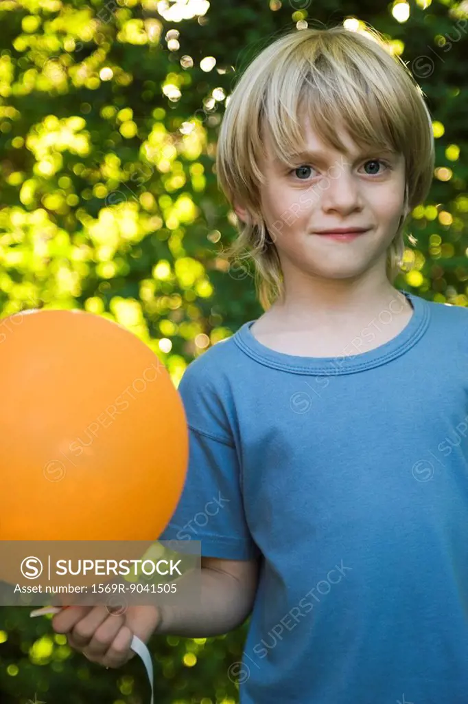 Boy with balloon, portrait
