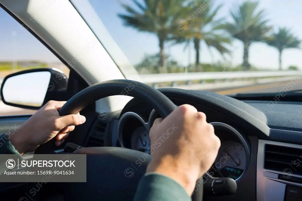 Driving with both hands on steering wheel