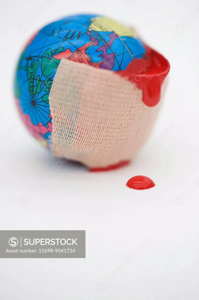 Adhesive bandage dripping blood wrapped around globe