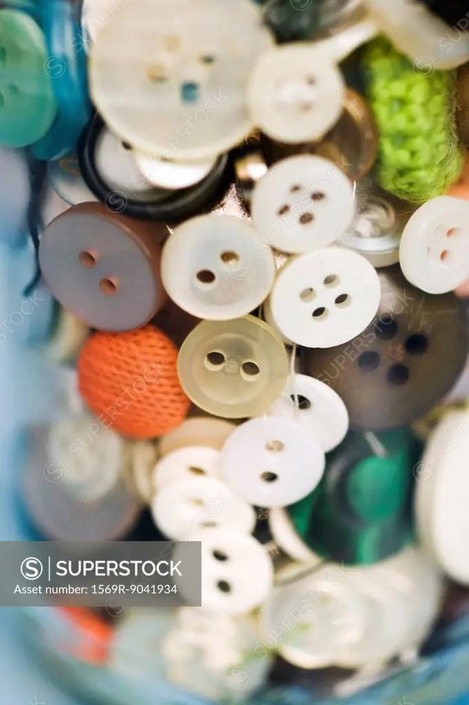 Buttons in glass jar