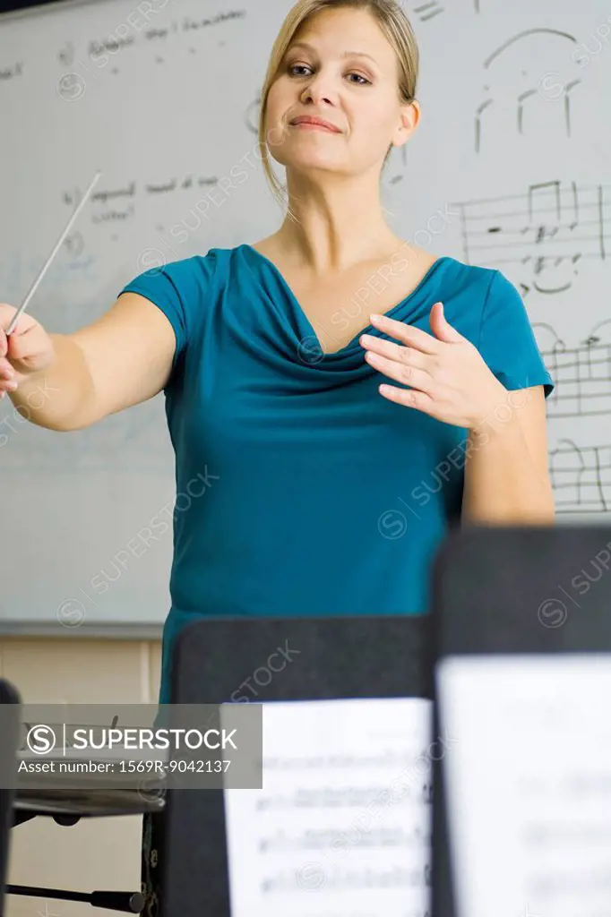 Music teacher conducting