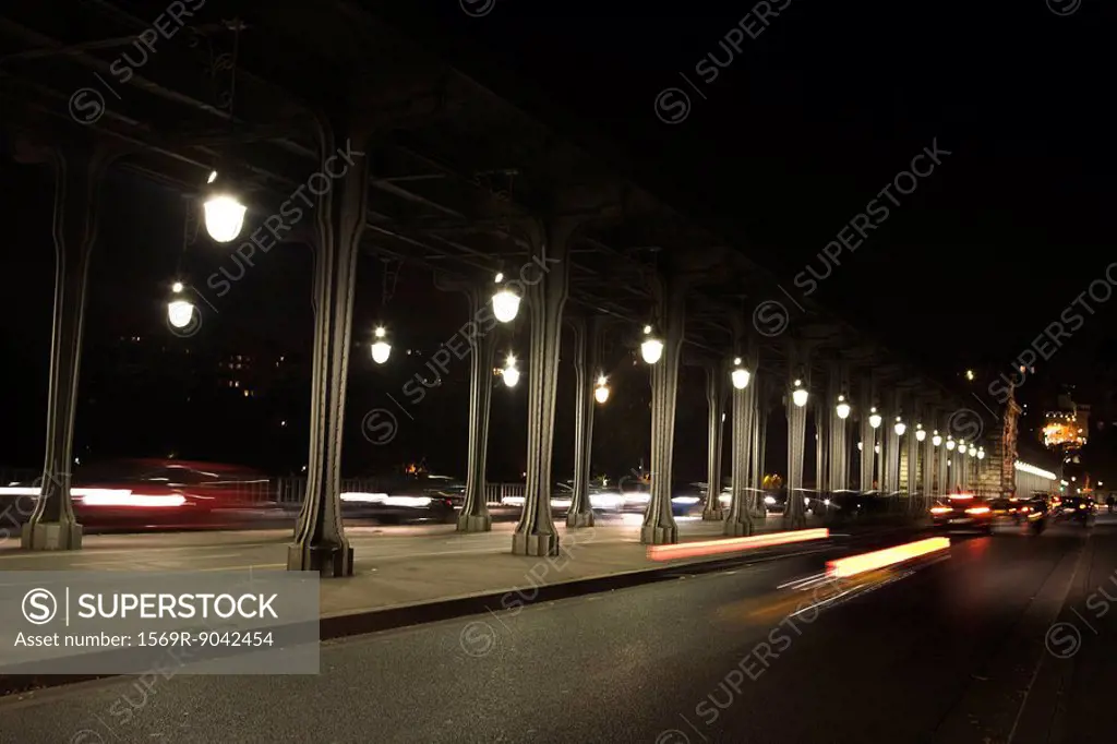 France, Paris, traffic moving on Pont Bir Hakeim at night