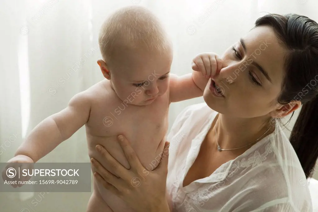 Mother holding infant