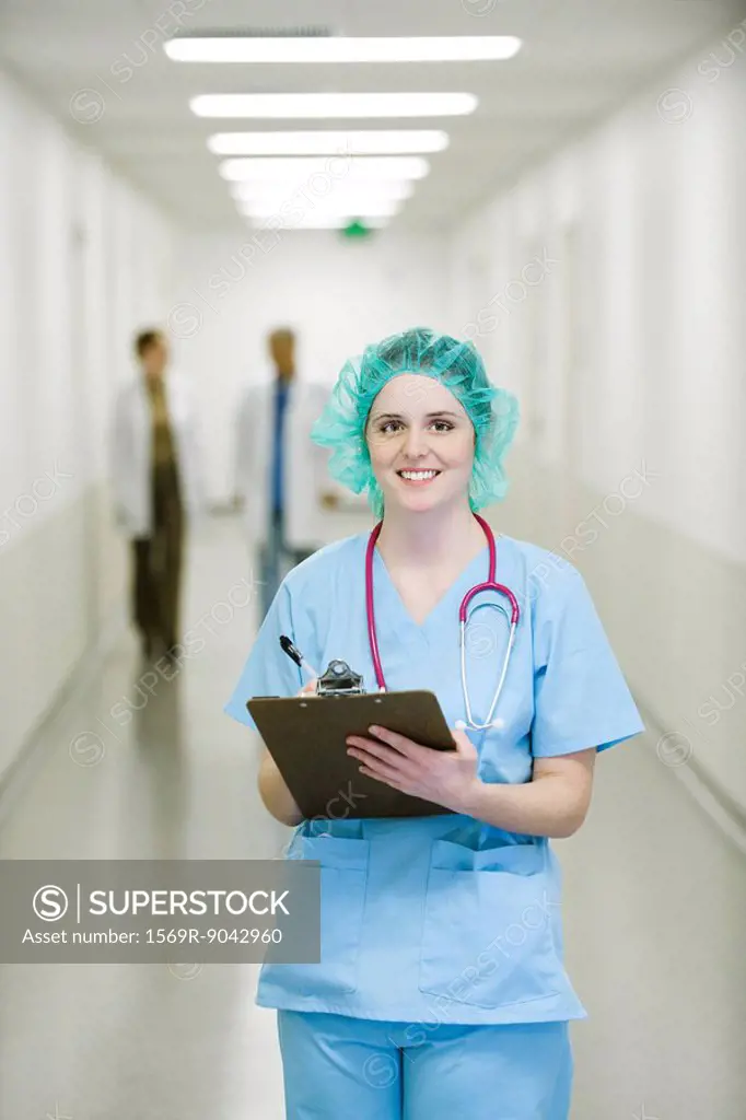 Nurse wearing surgical cap, portrait