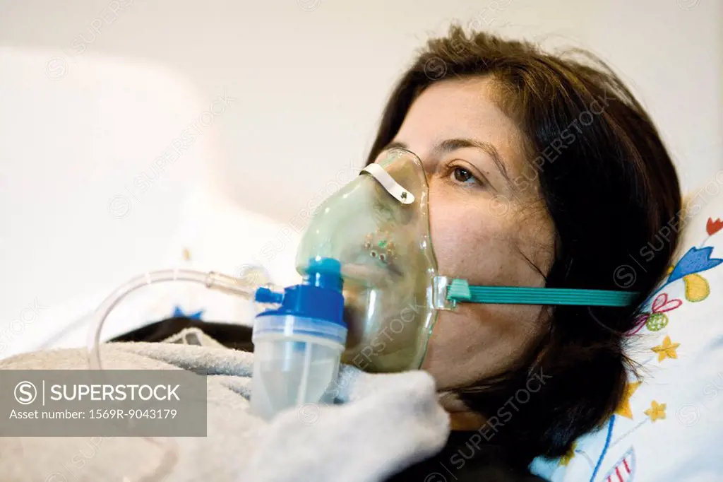 Woman receiving oxygen treatment