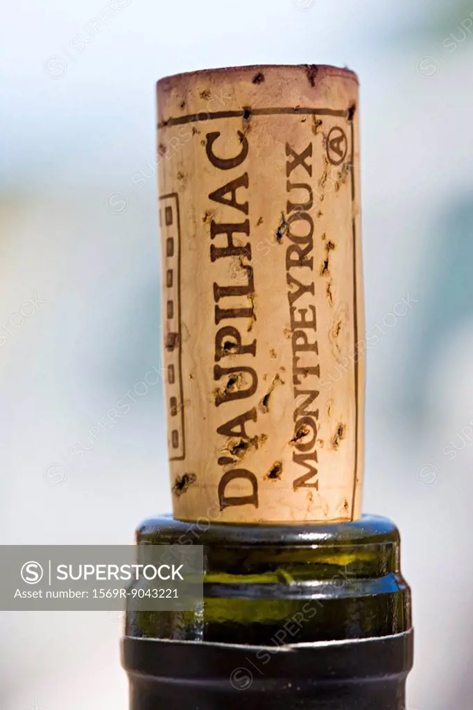 Corked wine bottle, close_up