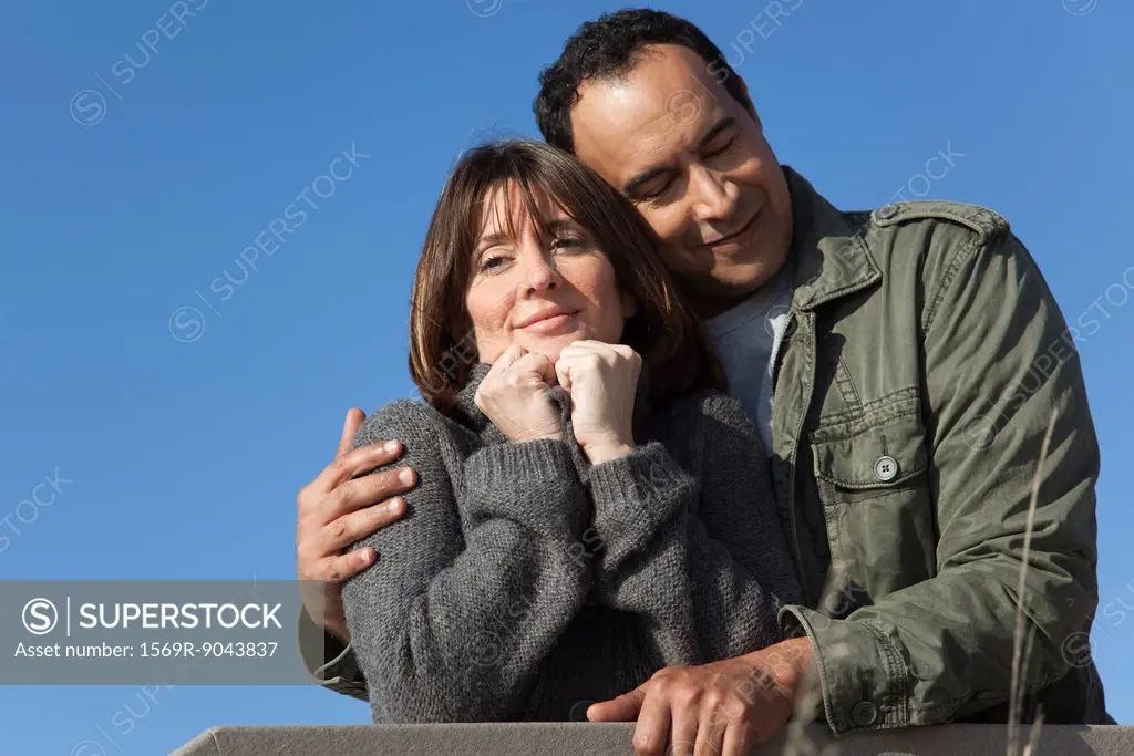 Mature couple relaxing together outdoors