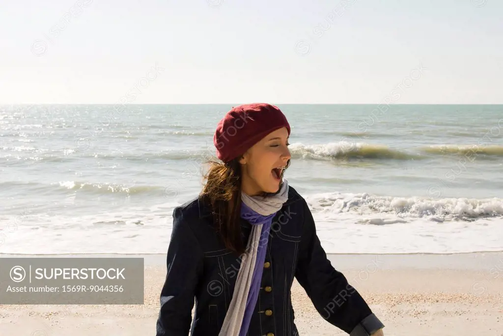 Preteen girl at beach on winter´s day