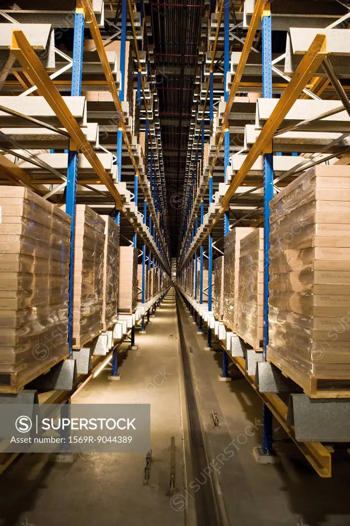 Automated Storage and Retrieval System, AS/RS, operating in the dark to conserve energy in warehouse