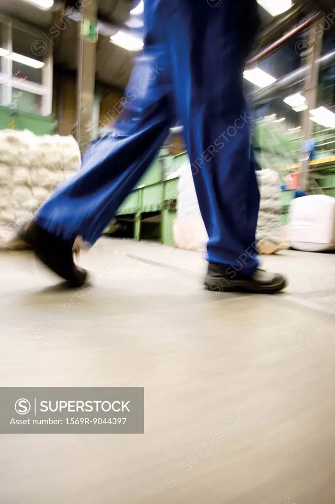 Factory worker walking, low section