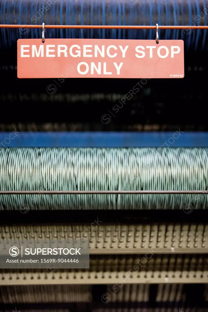 Emergency stop on weaving machine in carpet tile factory