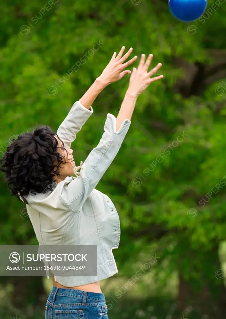 Woman throwng ball