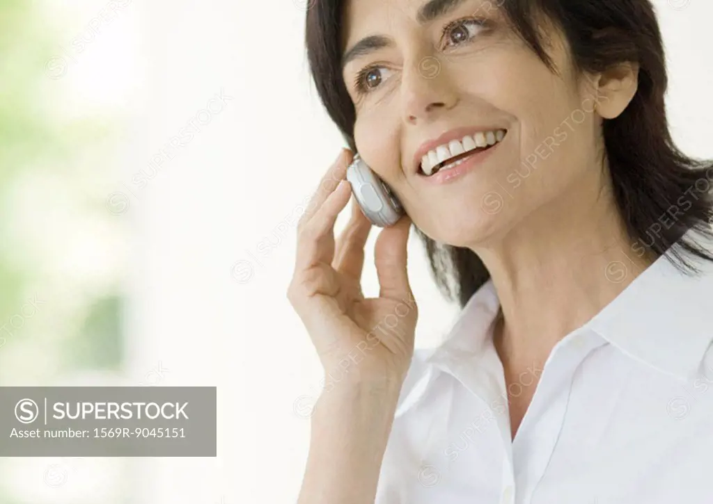 Mature woman using cell phone