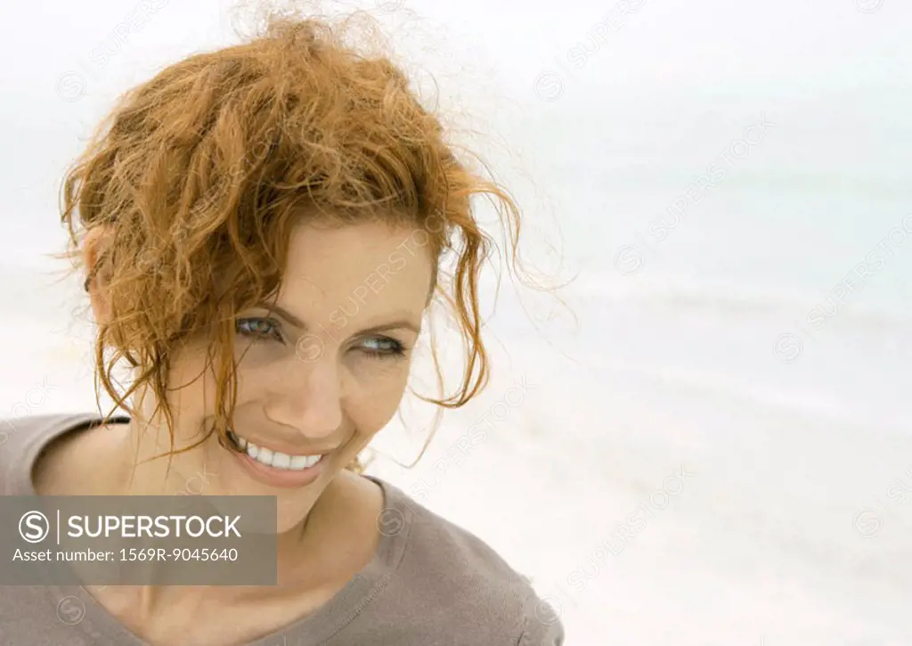 Woman smiling on beach