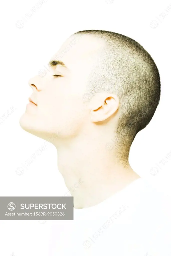 Young man´s head, eyes closed, profile