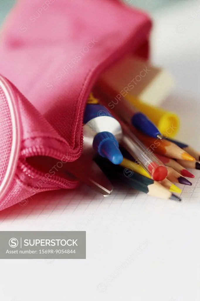Colored pencils spilling out of pencil case