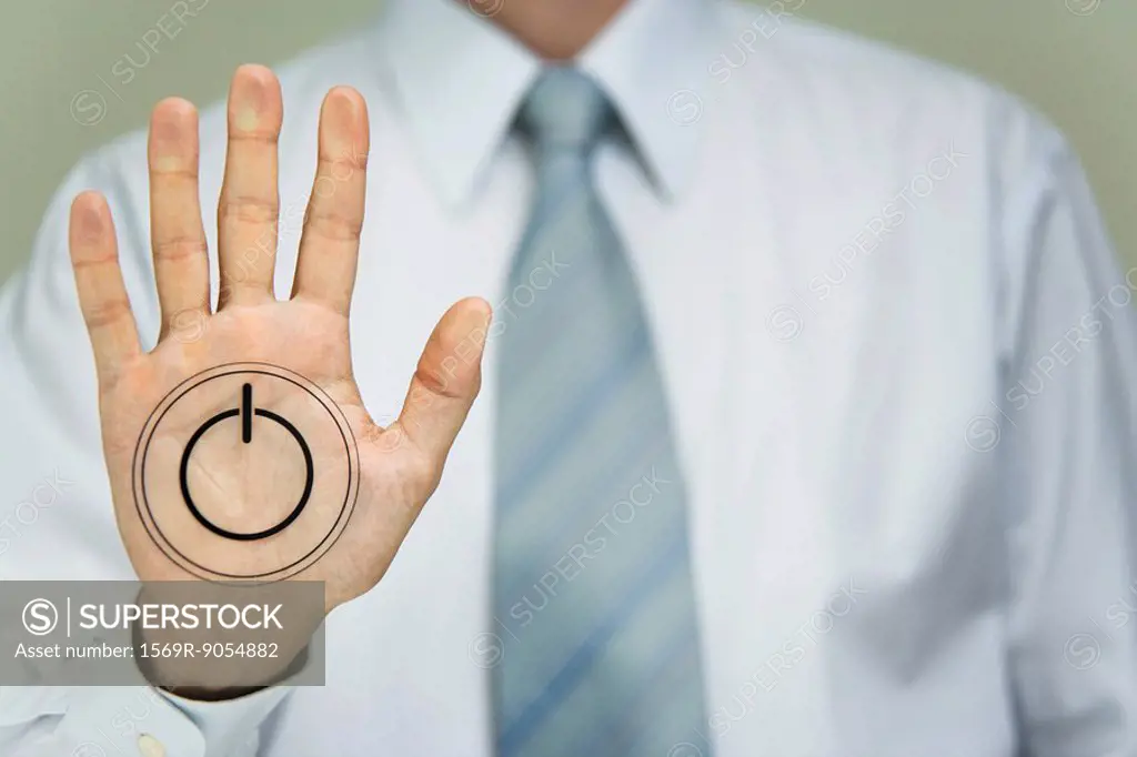 Man with power button on palm of hand
